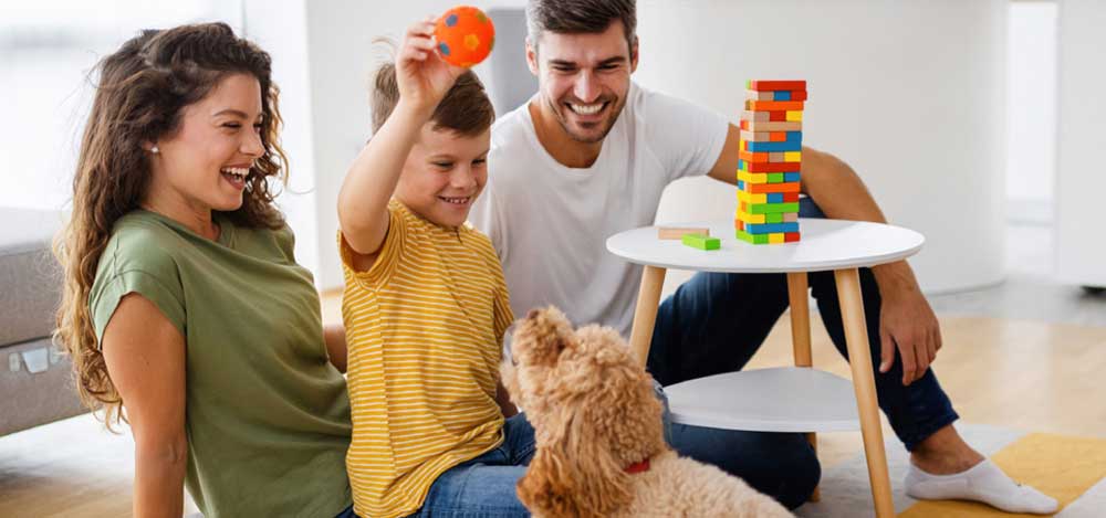 Family playing in a new home in Texas